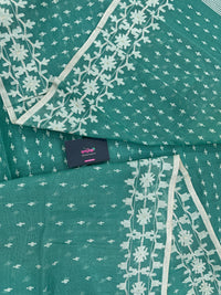 Mint cotton jamdani saree with white threads work all over work and blouse piece.