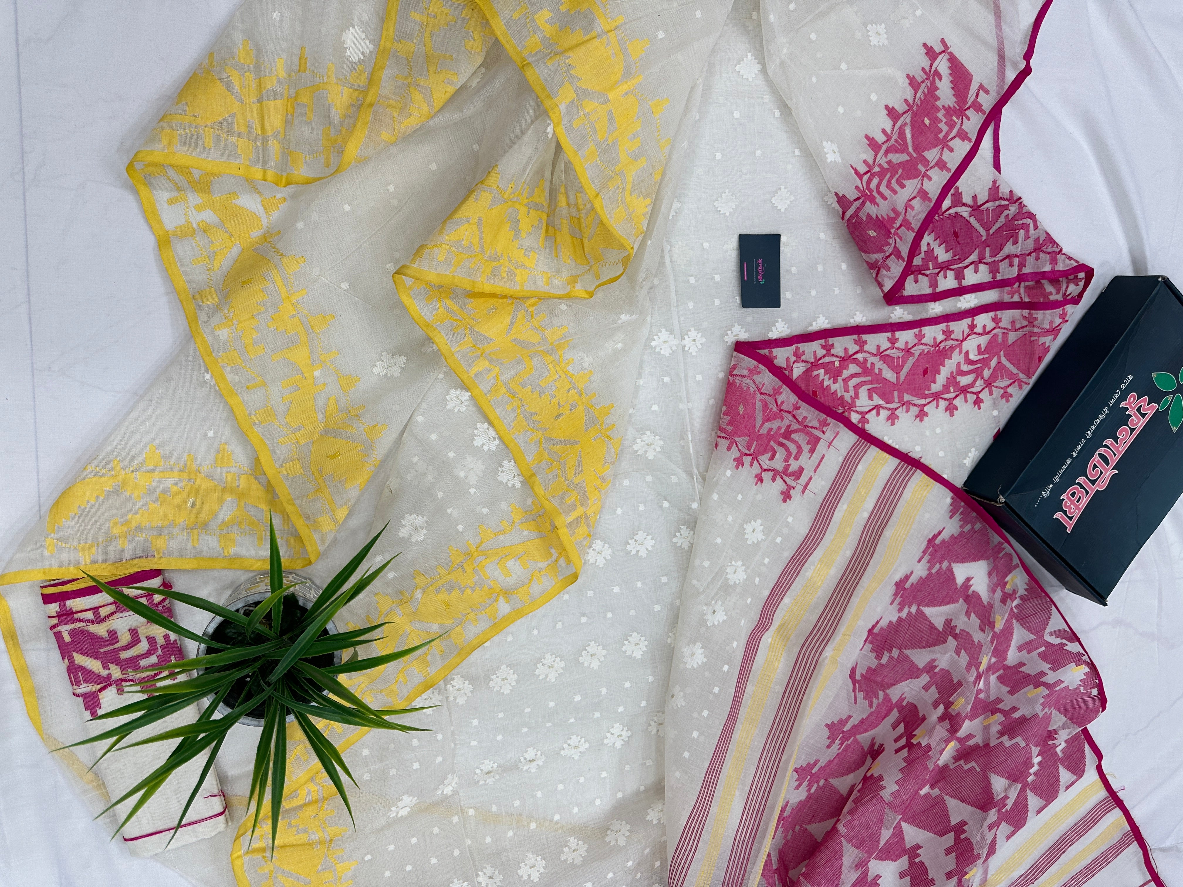 White cotton gonga jamuna design jamdani saree with pink & yellow threads work.