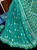 Sea green halfsilk jamdani saree with golden silver & copper jori work.
