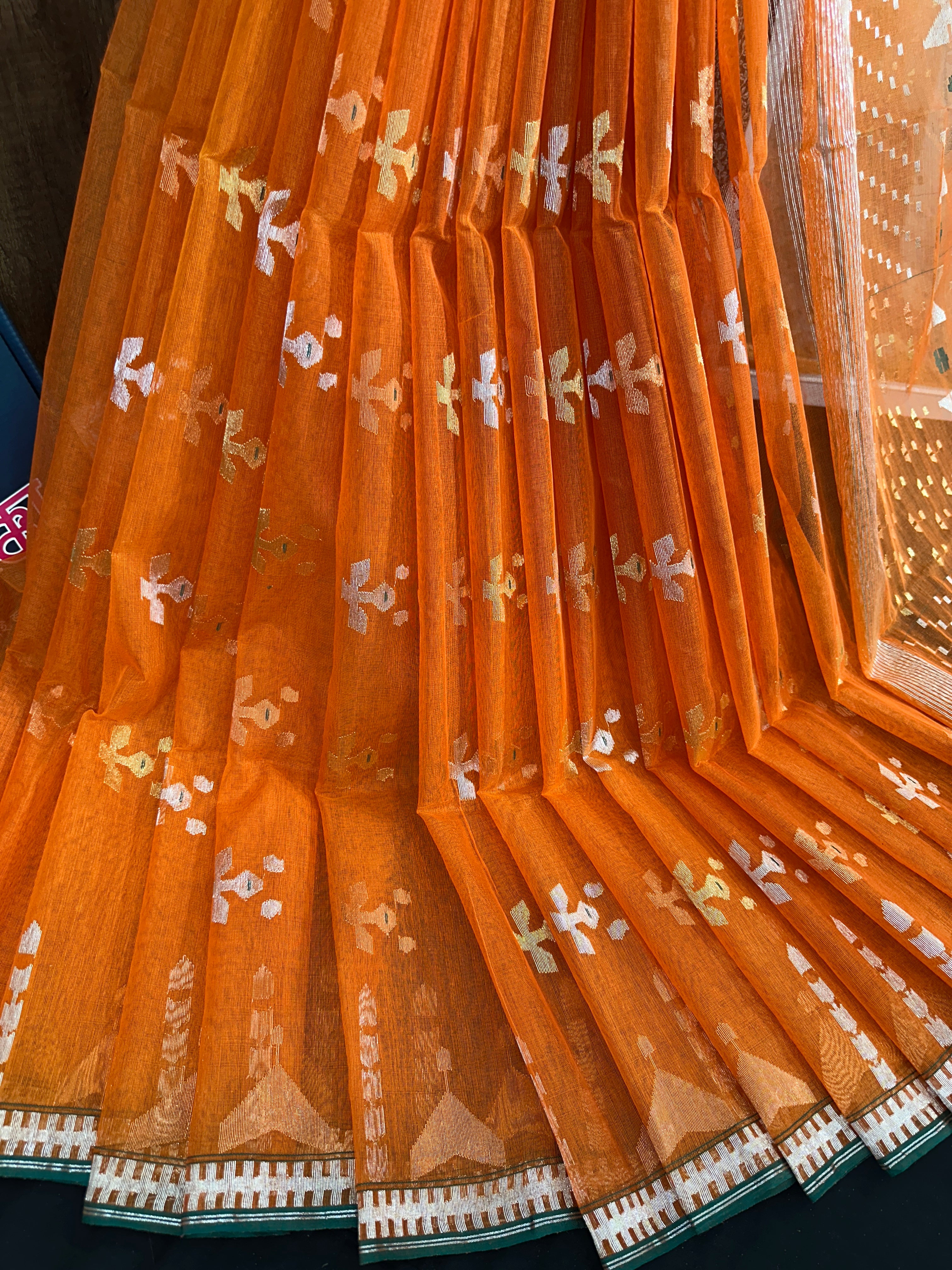 Fanta orange halfsilk jamdani saree with golden silver & copper jori work