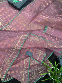 Onion colour jamdani saree with pink meena and green border.