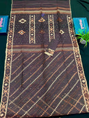 Brown colour jamdani saree with brown & off white threads work.