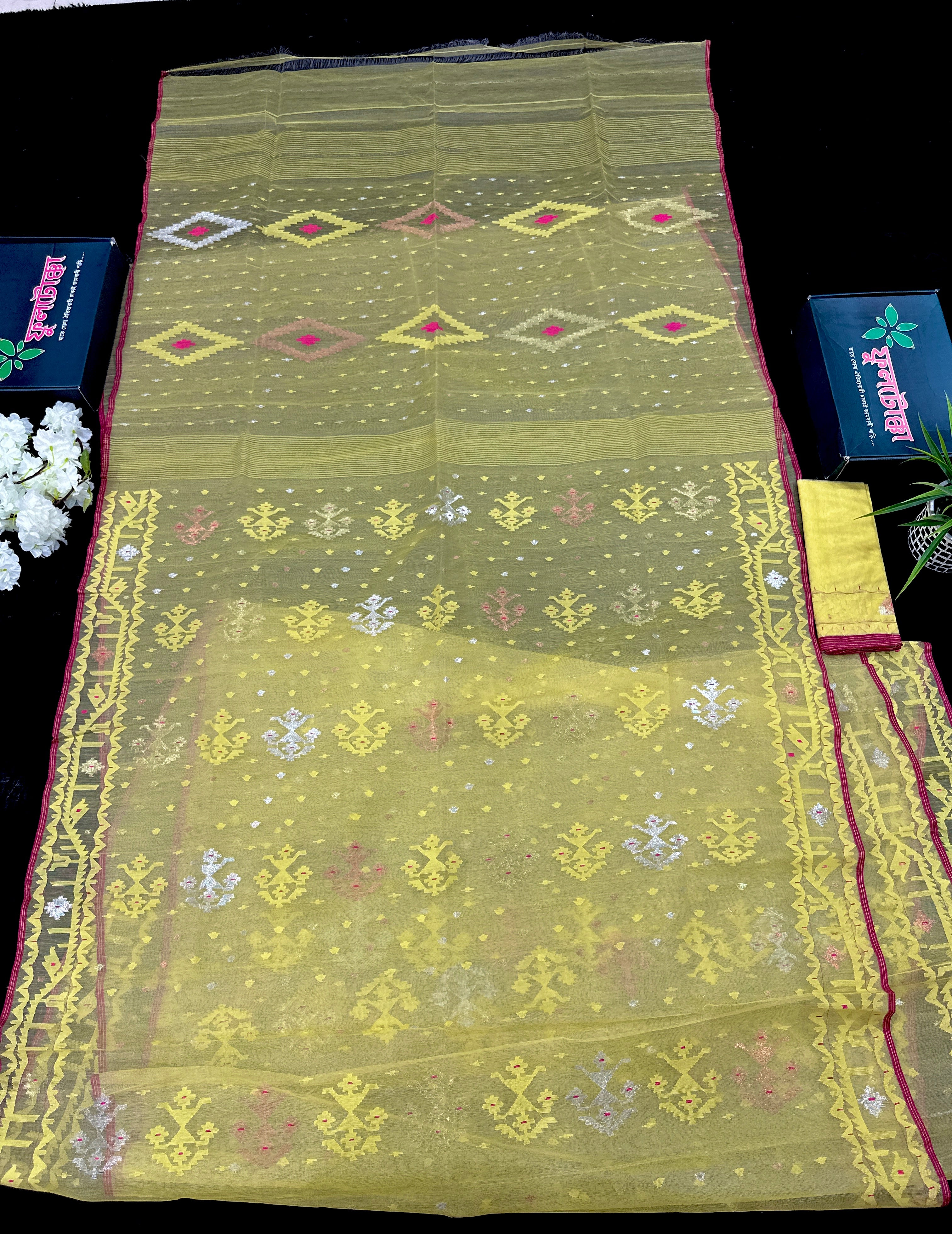 Pastel yellow dhakai jamdani saree with yellow threads silver & copper jori work all over work soft count.