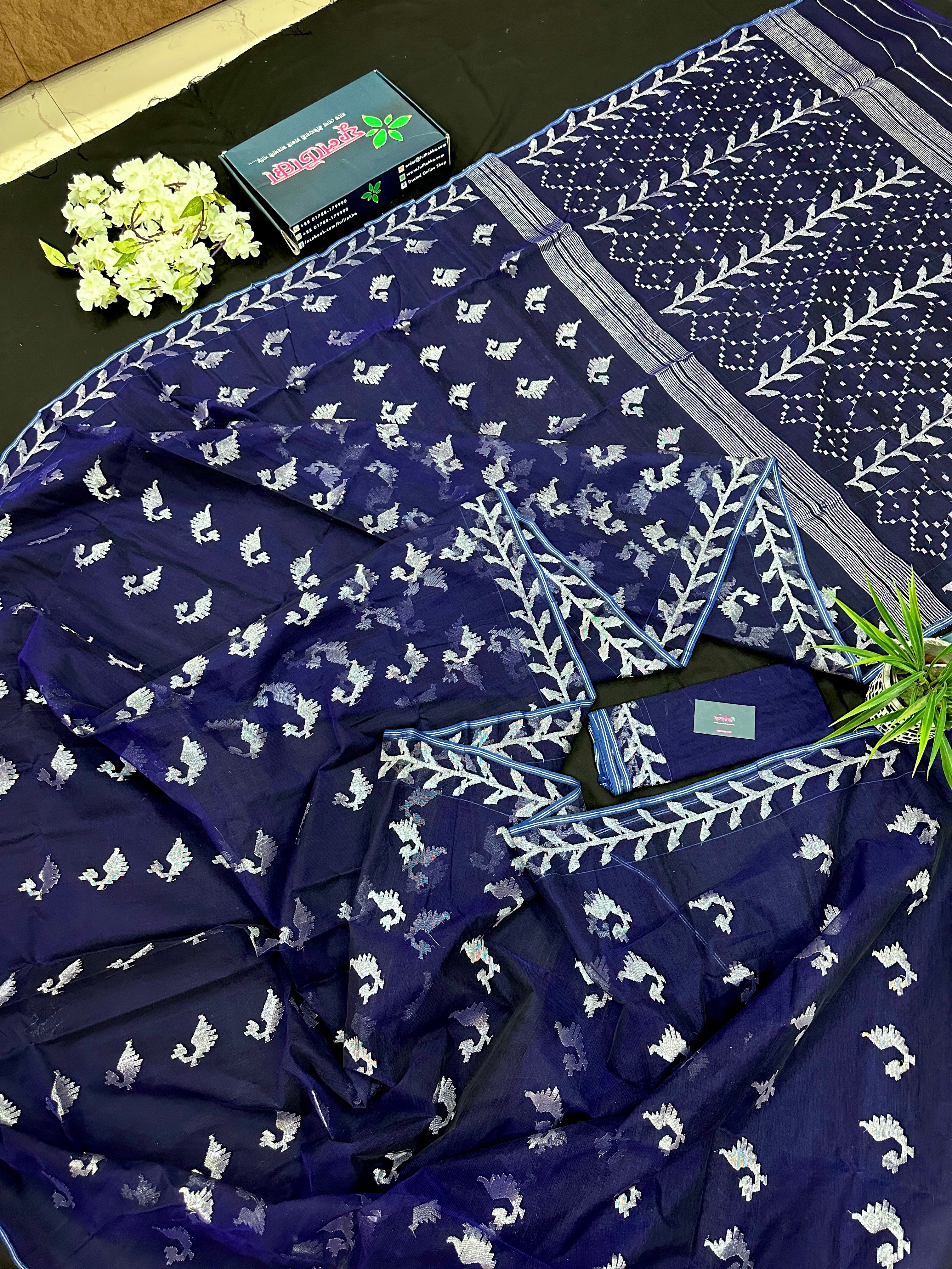 Navy blue jamdani saree with silver jori work soft threads all over work.