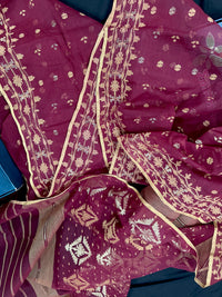 Maroon cotton jamdani with yellowish threads work.
