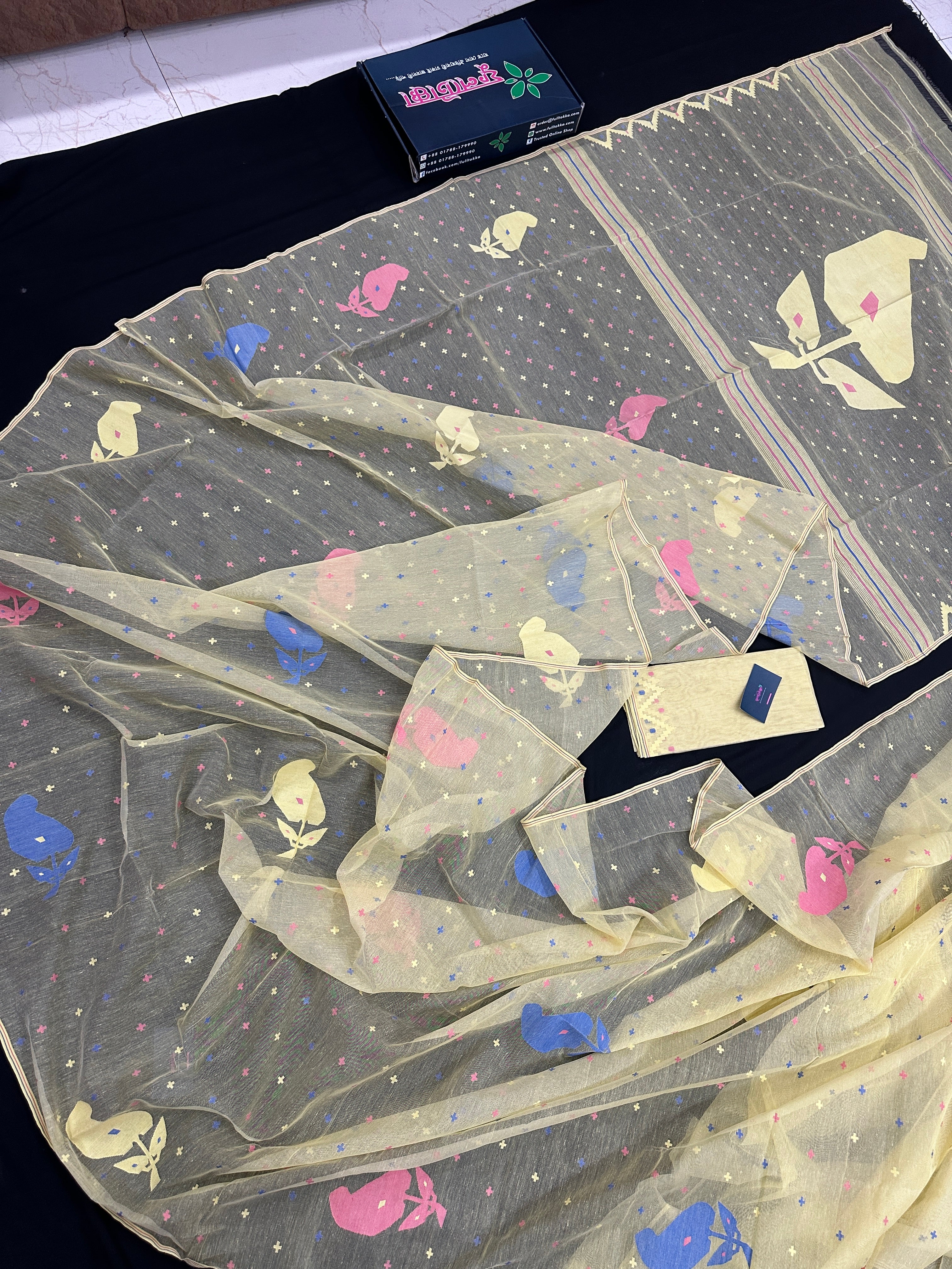 Baby yellow halfsilk jamdani saree with blue pink baby yellow threads work.