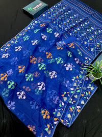 Royal blue jamdani saree with green pink blue orange threads work.