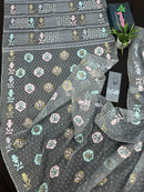 Ash jamdani saree with pink blue and with threads work and golden jori work.