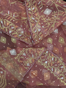 Nude Onion Exclusive Dhakai Jamdani saree with golden silver & copper jori work.