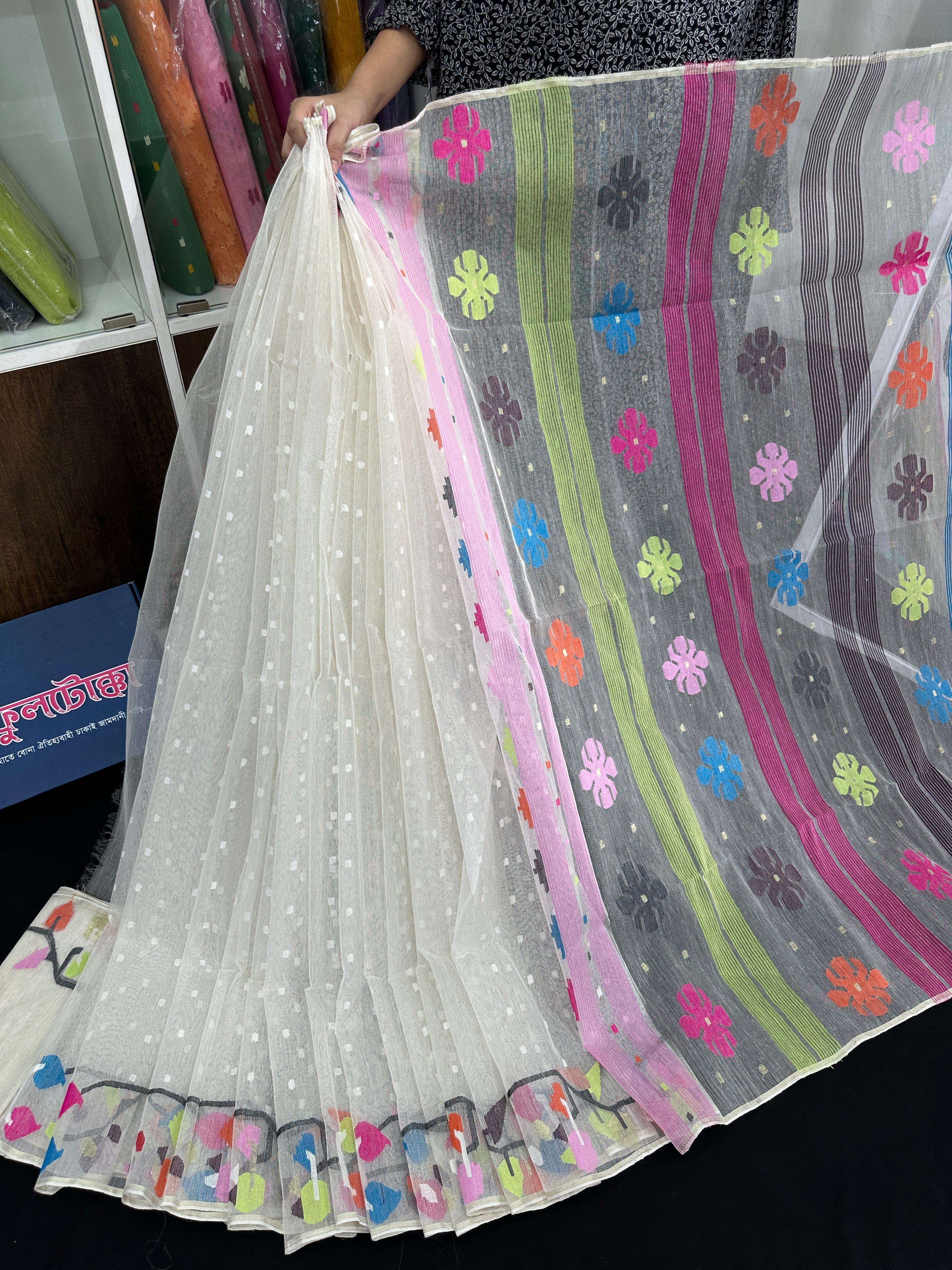 White cotton jamdani saree with pink blue orange magenta yellow multiple colour threads work