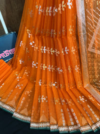 Fanta orange halfsilk jamdani saree with golden silver & copper jori work