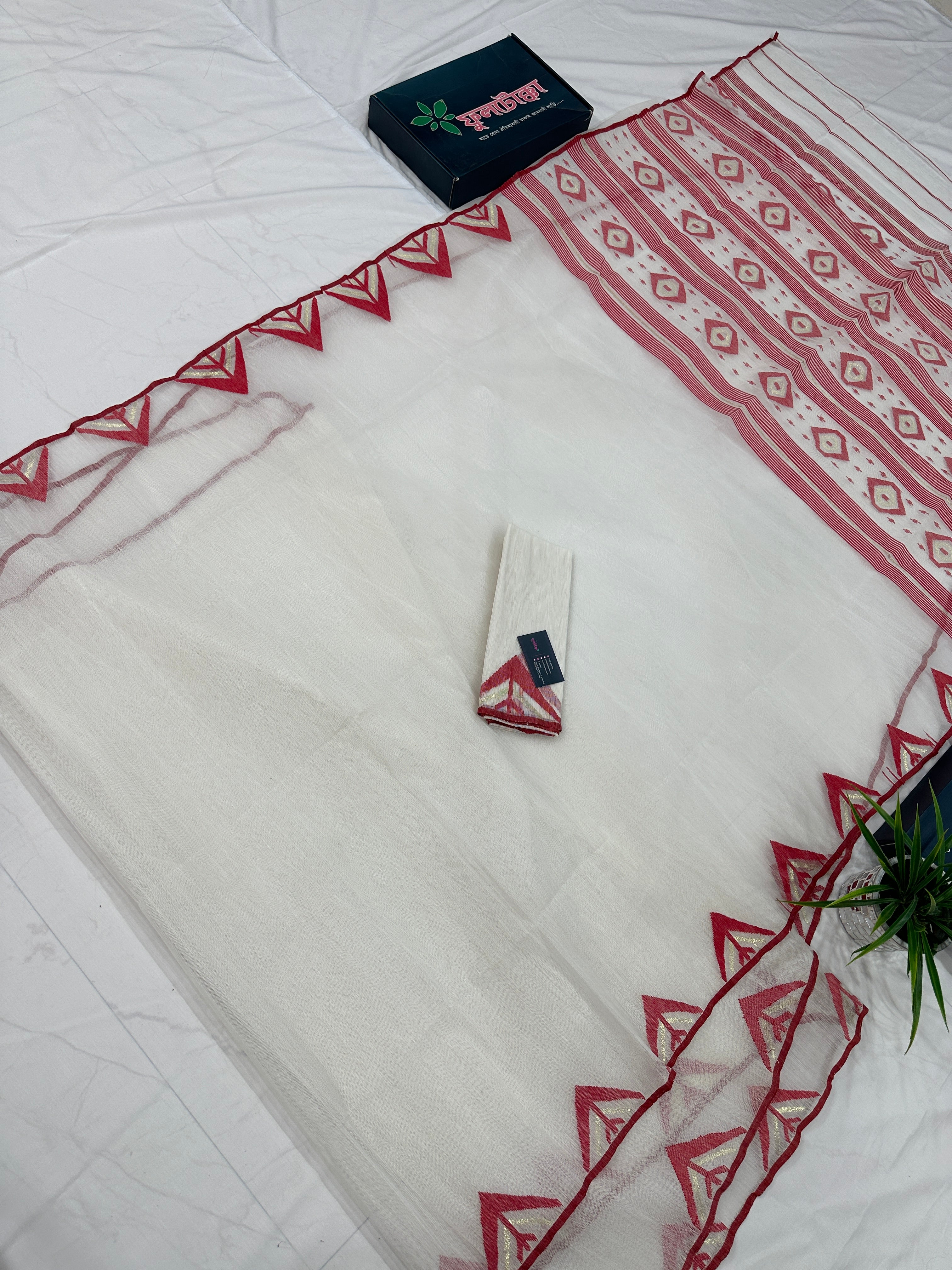 White Jamdani Saree With Red Paar.