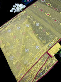Pastel yellow dhakai jamdani saree with yellow threads silver & copper jori work all over work soft count.