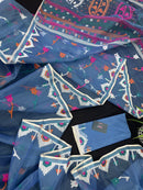 Dusty blue jamdani saree with pink white blue green work and white paar.