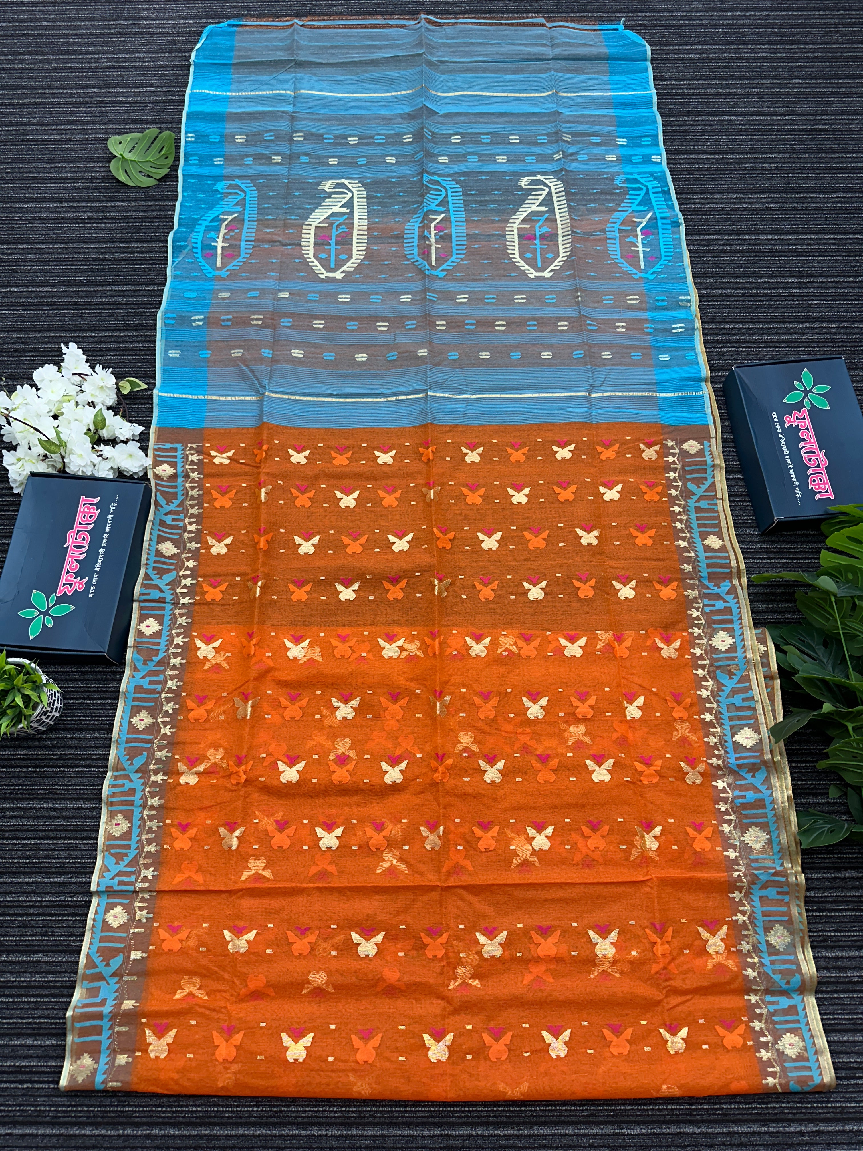 Fanta orange halfsilk jamdani saree with golden jori work and blue orange threads work