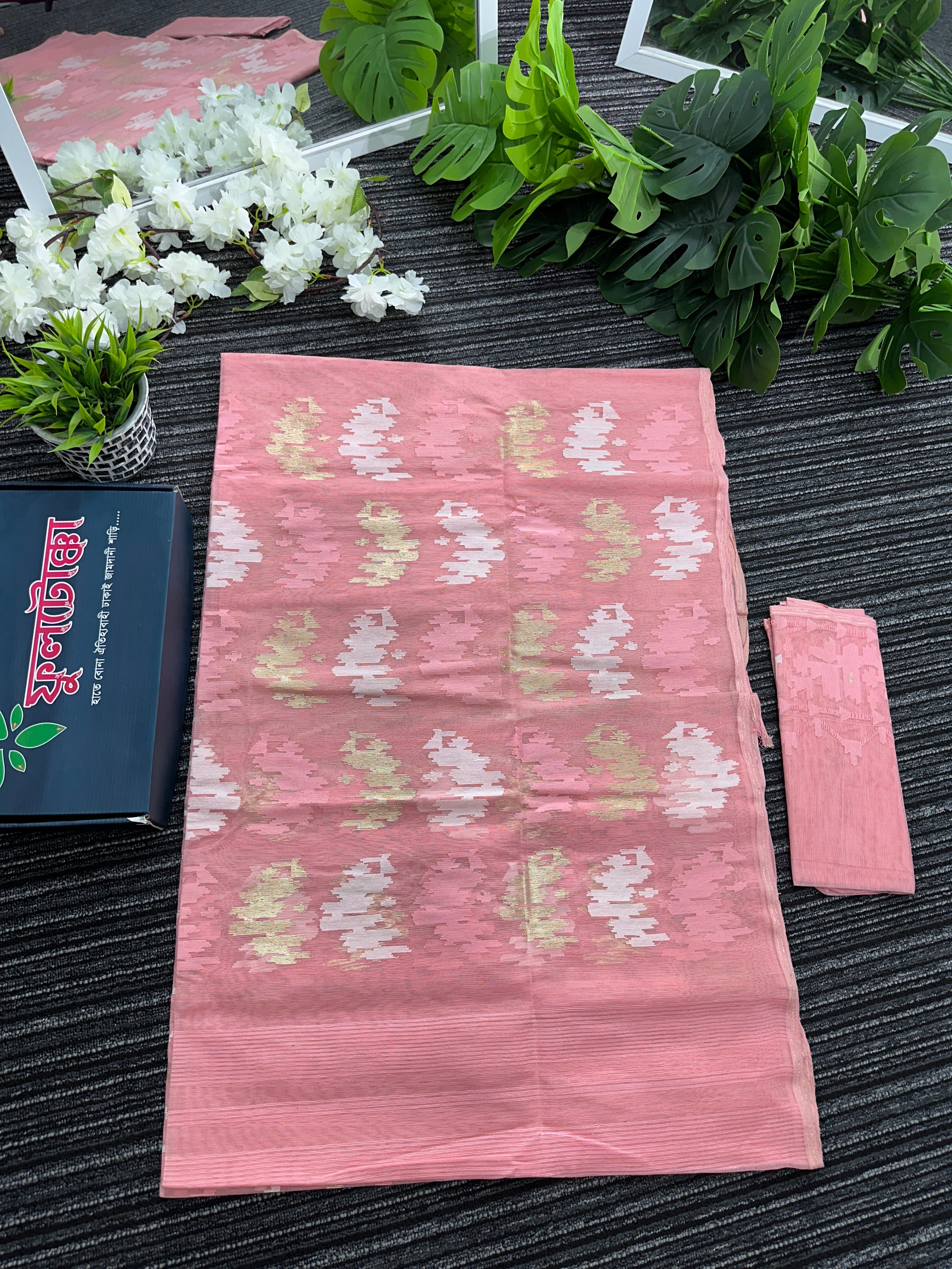 Blushing peach halfsilk jamdani saree with golden jori work and white threads work