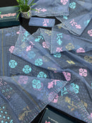 Powdery blue jamdani saree with pink blue and golden jori work.