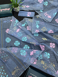 Powdery blue jamdani saree with pink blue and golden jori work.