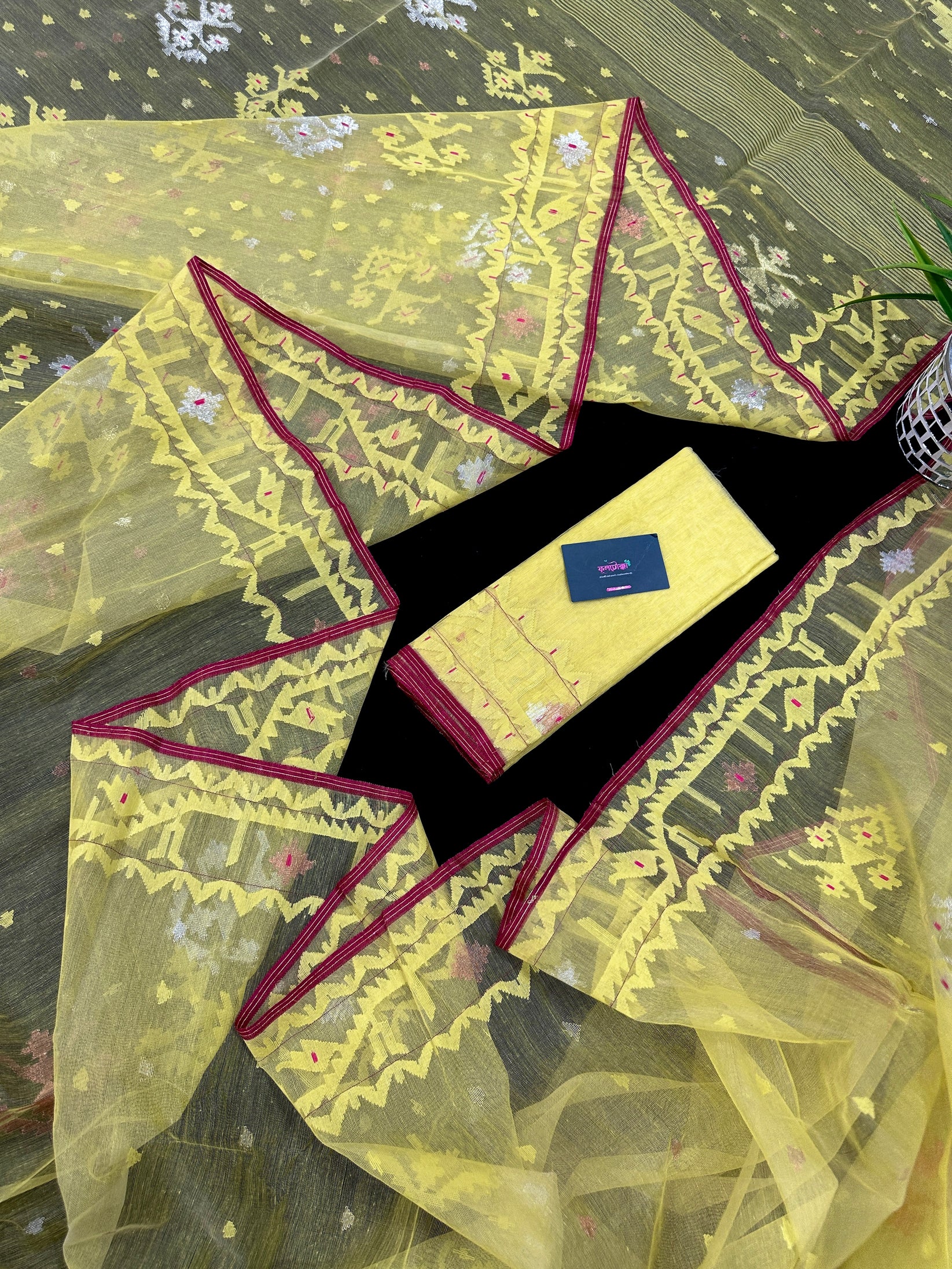 Pastel yellow dhakai jamdani saree with yellow threads silver & copper jori work all over work soft count.