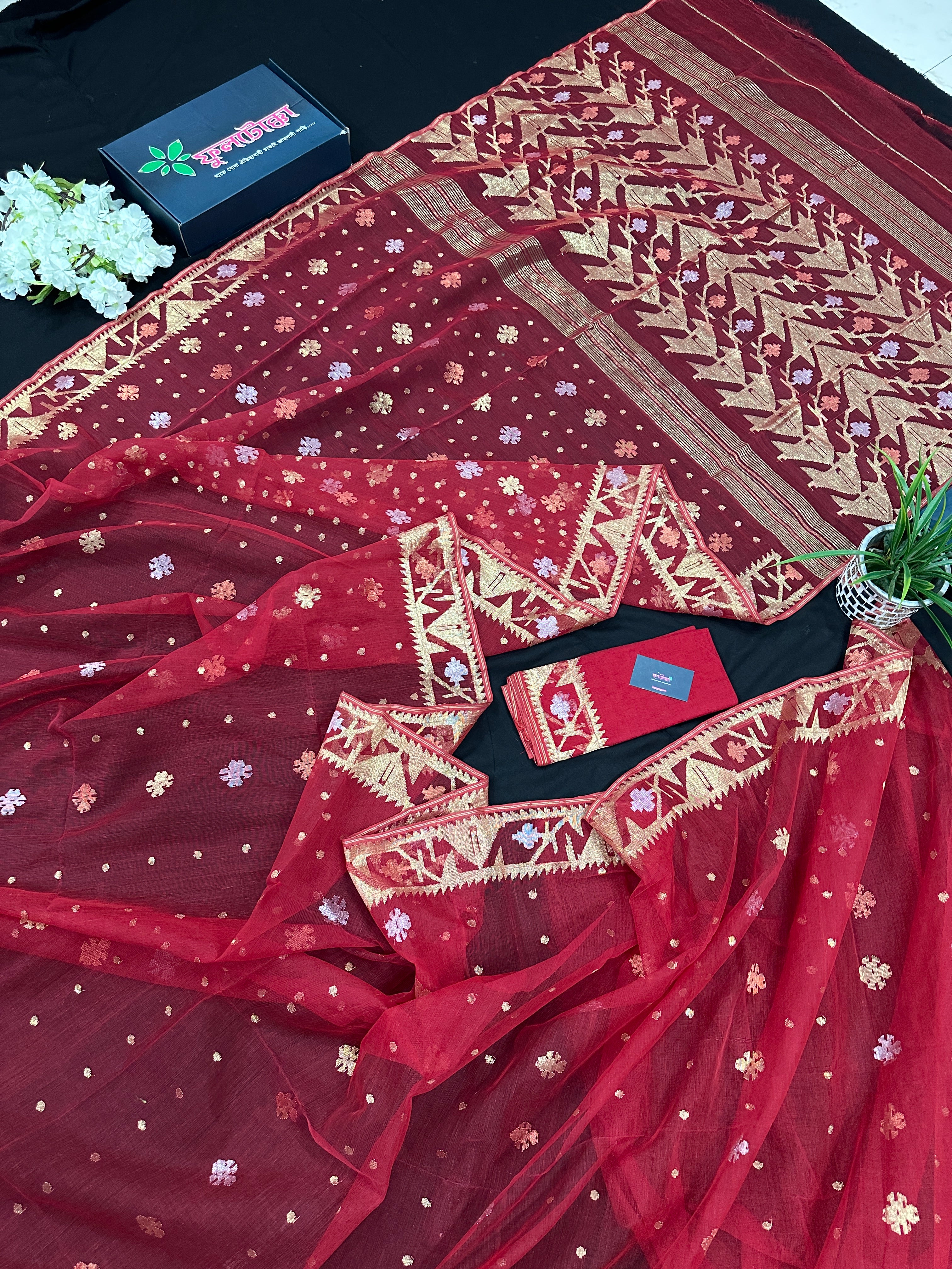 Red jamdani saree with golden jori all over work with blouse piece.