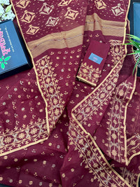 Maroon cotton jamdani with yellowish threads work.
