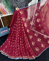 Maroon cotton jamdani saree with golden jori work and blouse piece.