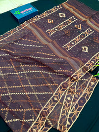 Brown colour jamdani saree with brown & off white threads work.