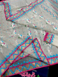 White jamdani with pink border.