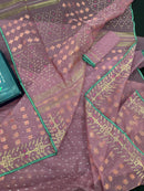 Onion colour jamdani saree with pink meena and green border.