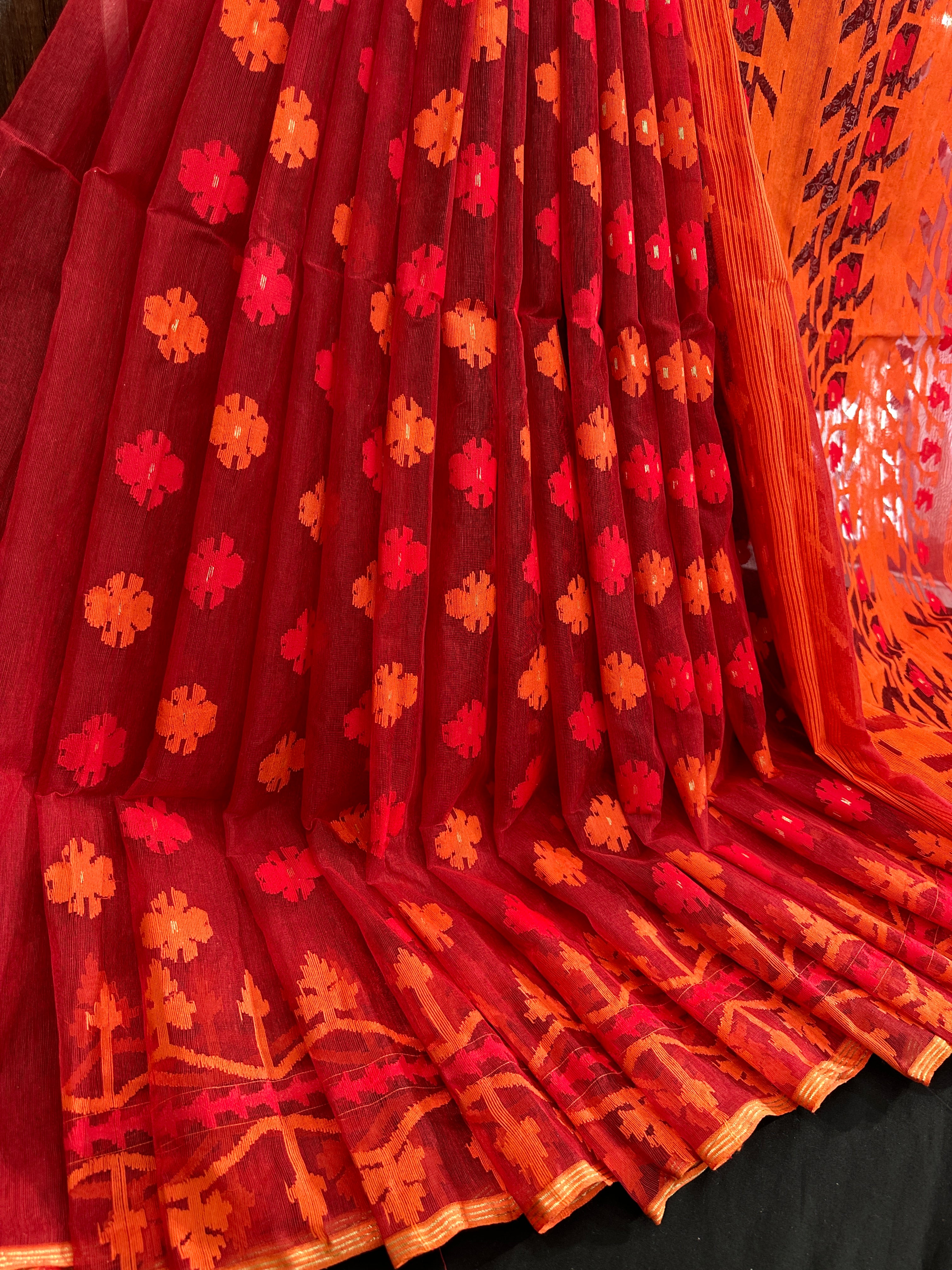 Maroon red jamdani saree with orange and red threads work