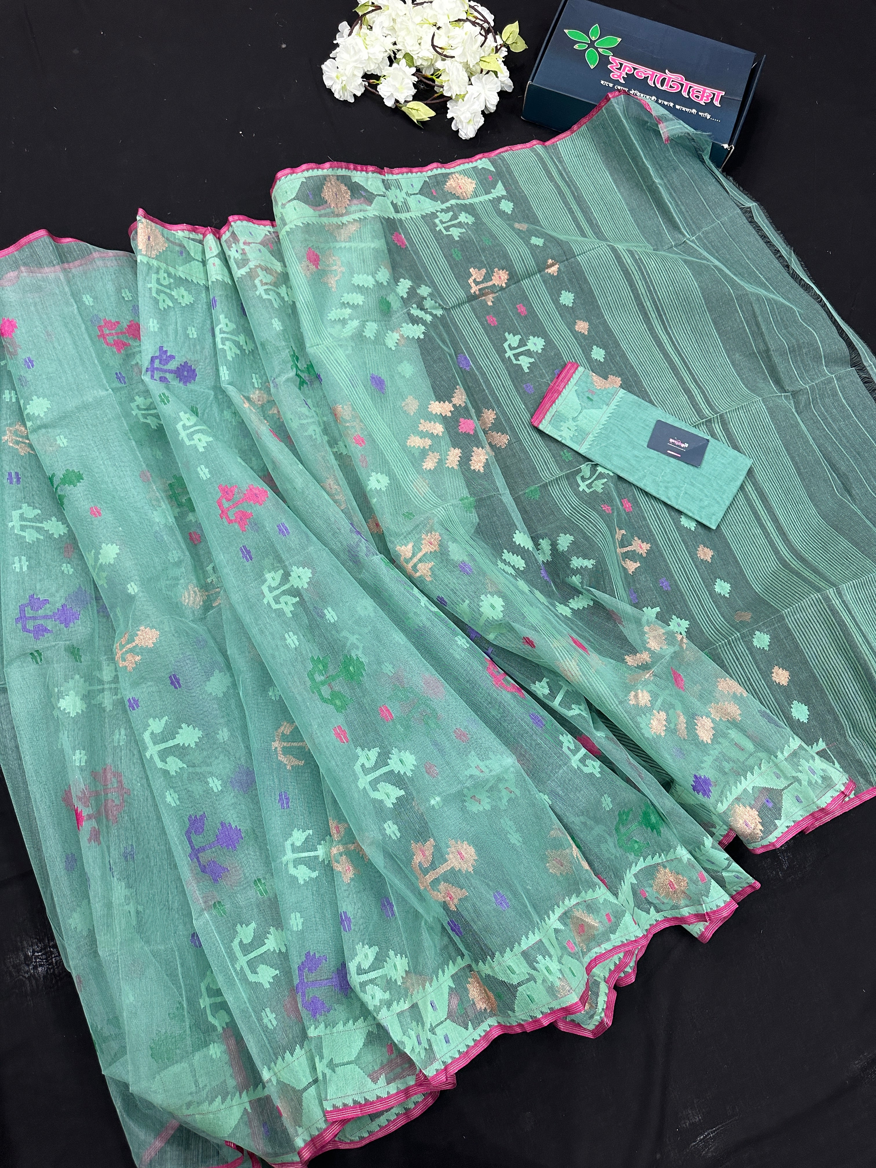 Bright Teal Blue dhakai Jamdani saree with pink border all over work soft count.