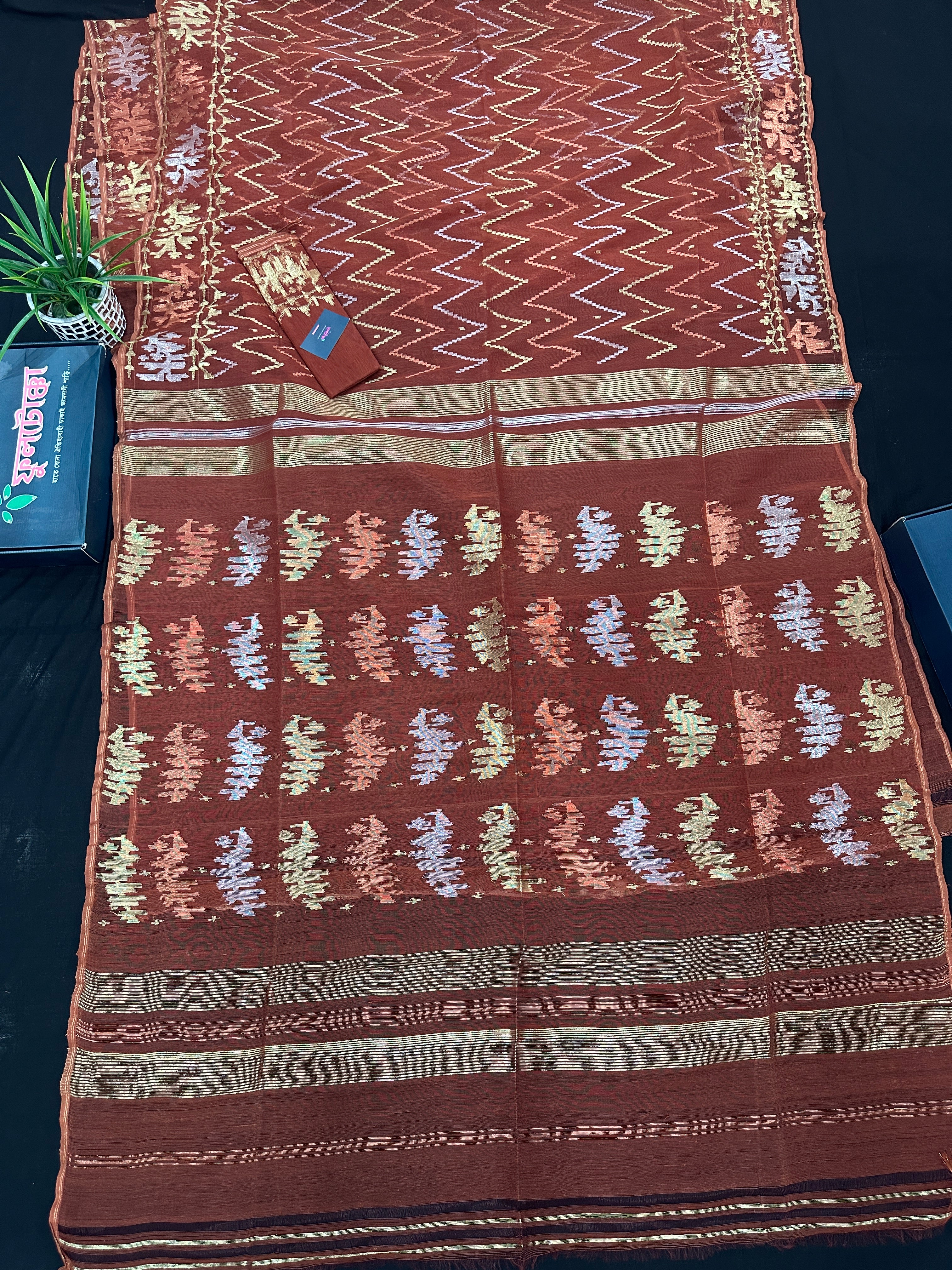 Brown reshom halfsilk jamdani saree with golden silver & copper jori work.