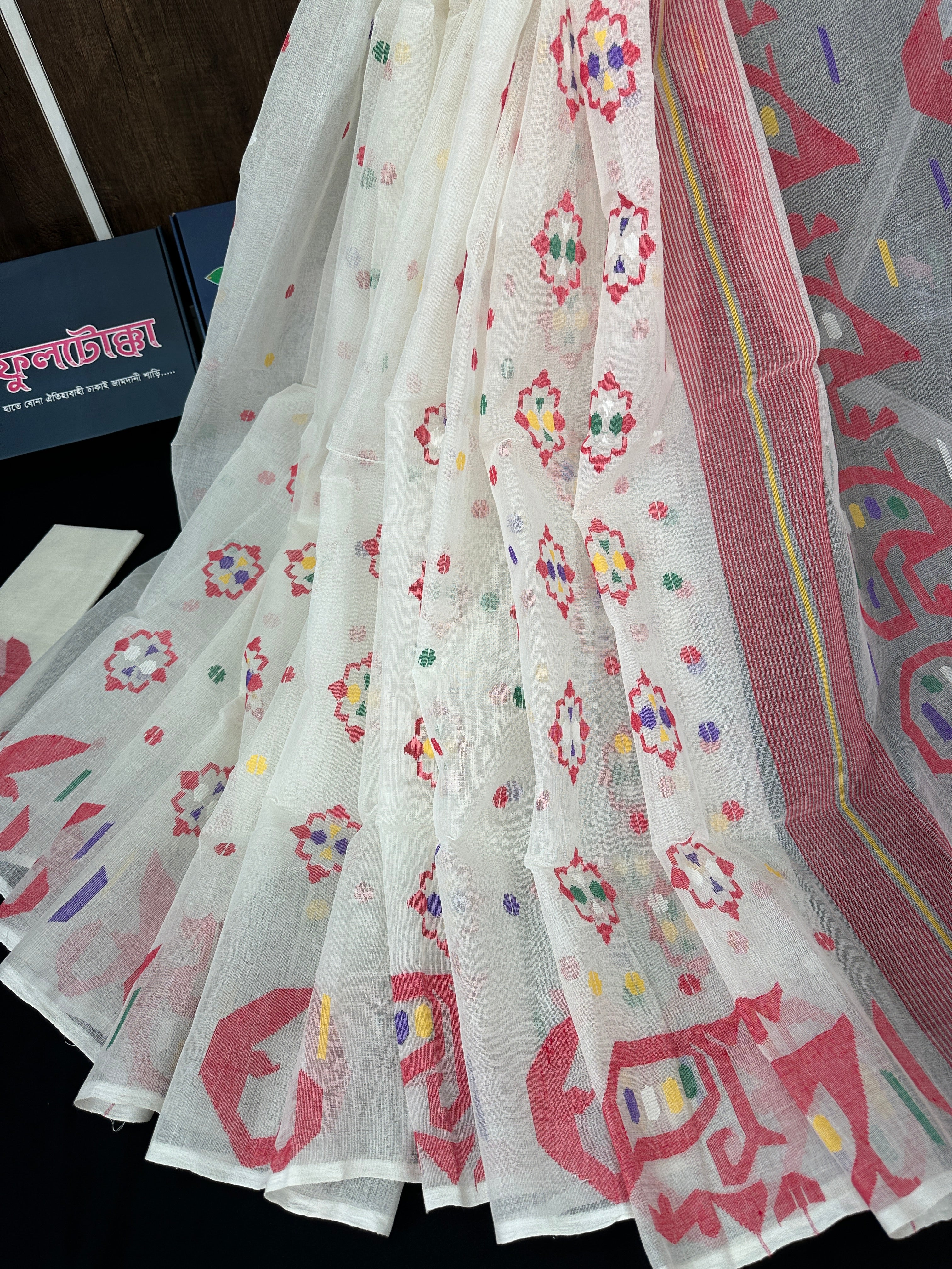 Pure white cotton jamdani saree with red blue green yellow multiple threads work