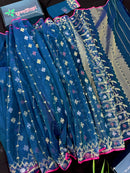Peacock blue jamdani saree with golden silver copper jori work and pink border