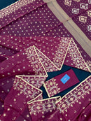 Maroon cotton jamdani with yellowish threads work.