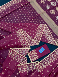 Maroon cotton jamdani with yellowish threads work.