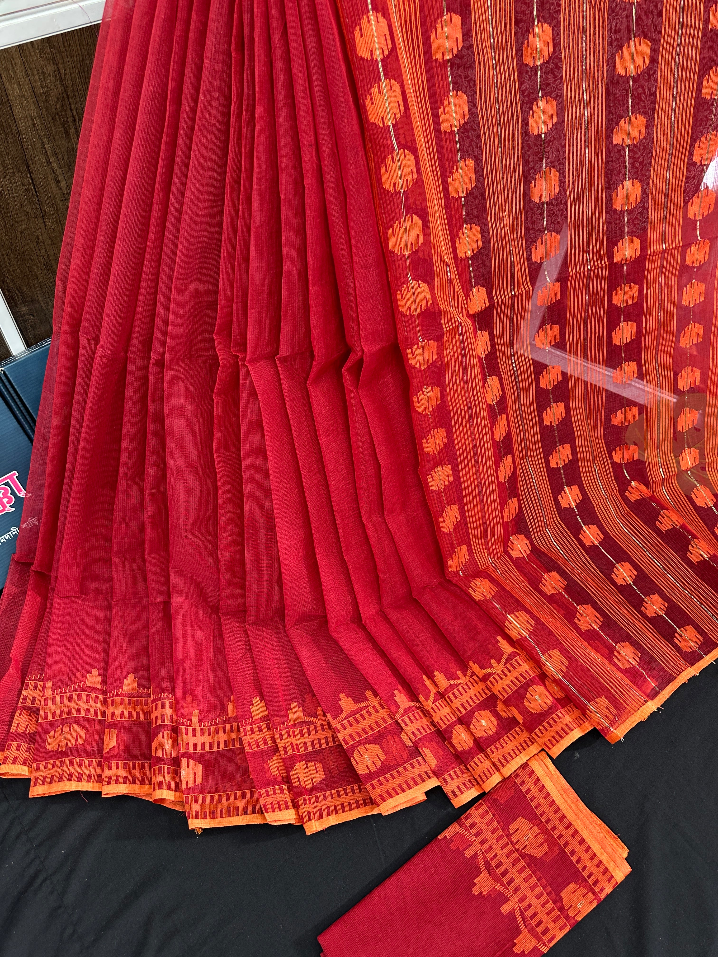 Red cotton jamdani saree with orange threads work