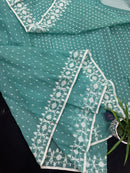 Mint cotton jamdani saree with white threads work all over work and blouse piece.