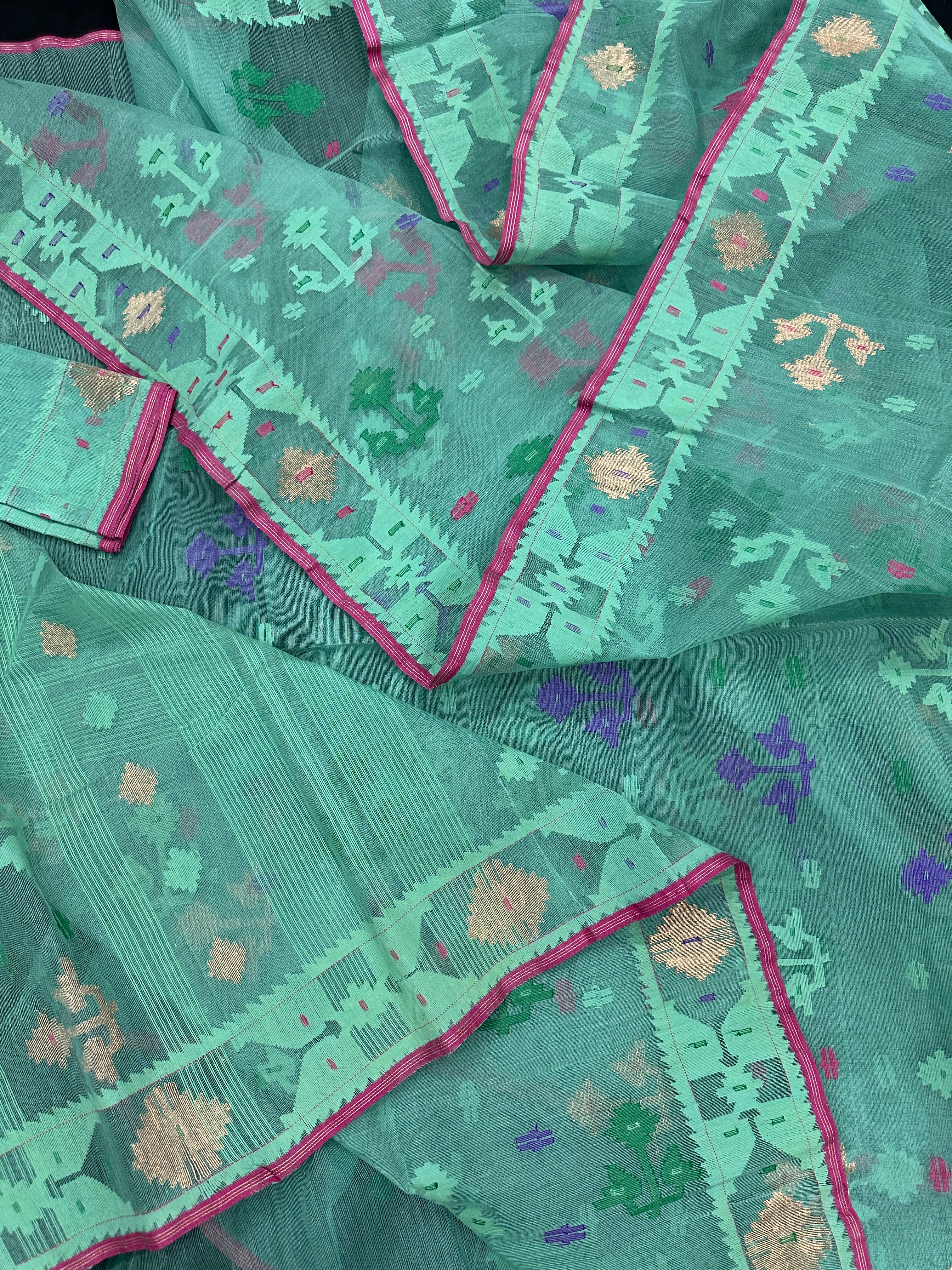 Bright Teal Blue dhakai Jamdani saree with pink border all over work soft count.