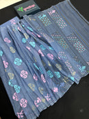 Powdery blue jamdani saree with pink blue and golden jori work.