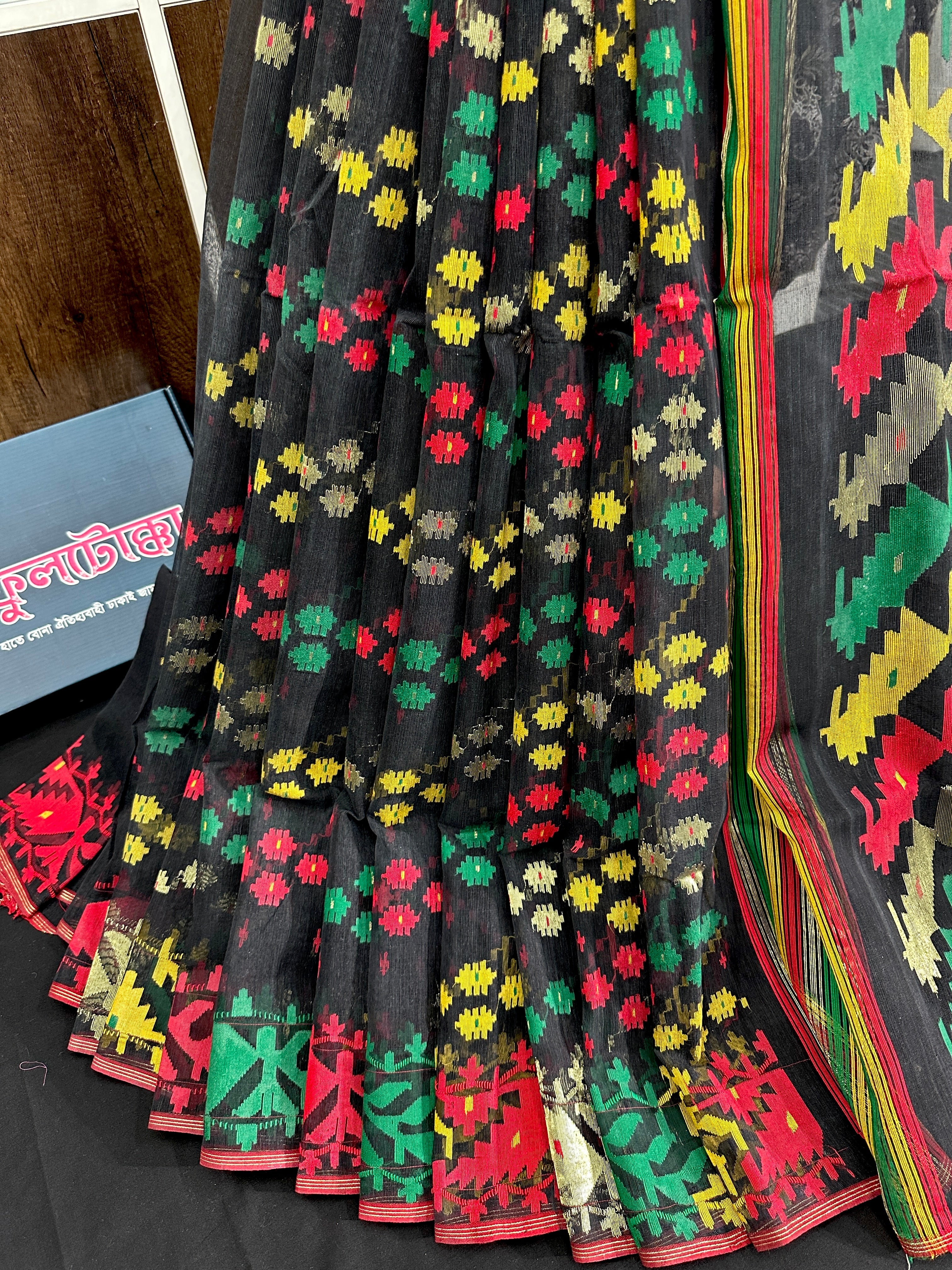 Black cotton jamdani saree with red green yellow multiple threads work