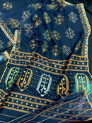 Navy blue jamdani saree with orange  green & off white threads work.
