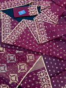 Maroon cotton jamdani with yellowish threads work.