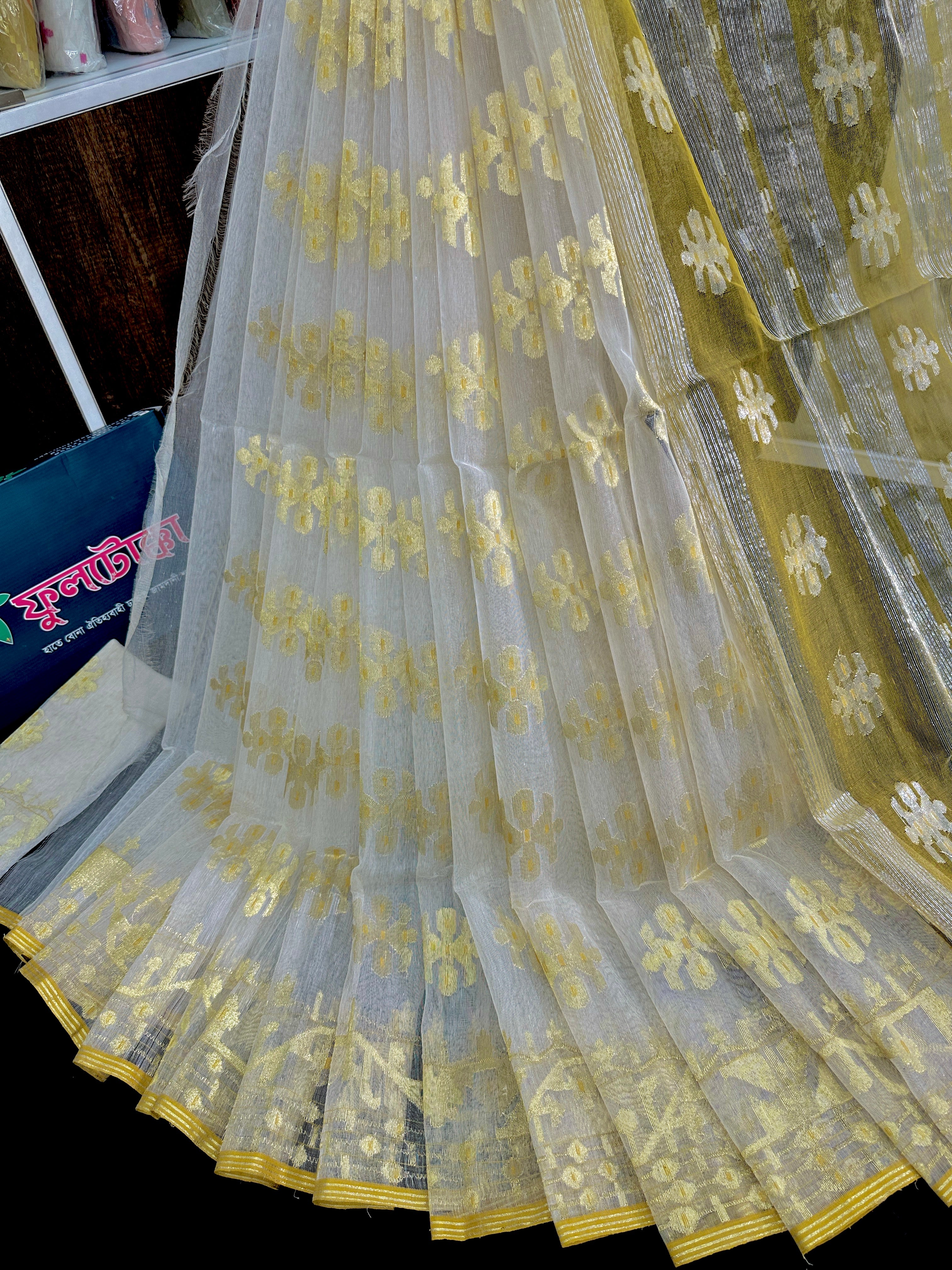 Creamy white halfsilk jamdani saree with golden jori work and blouse piece