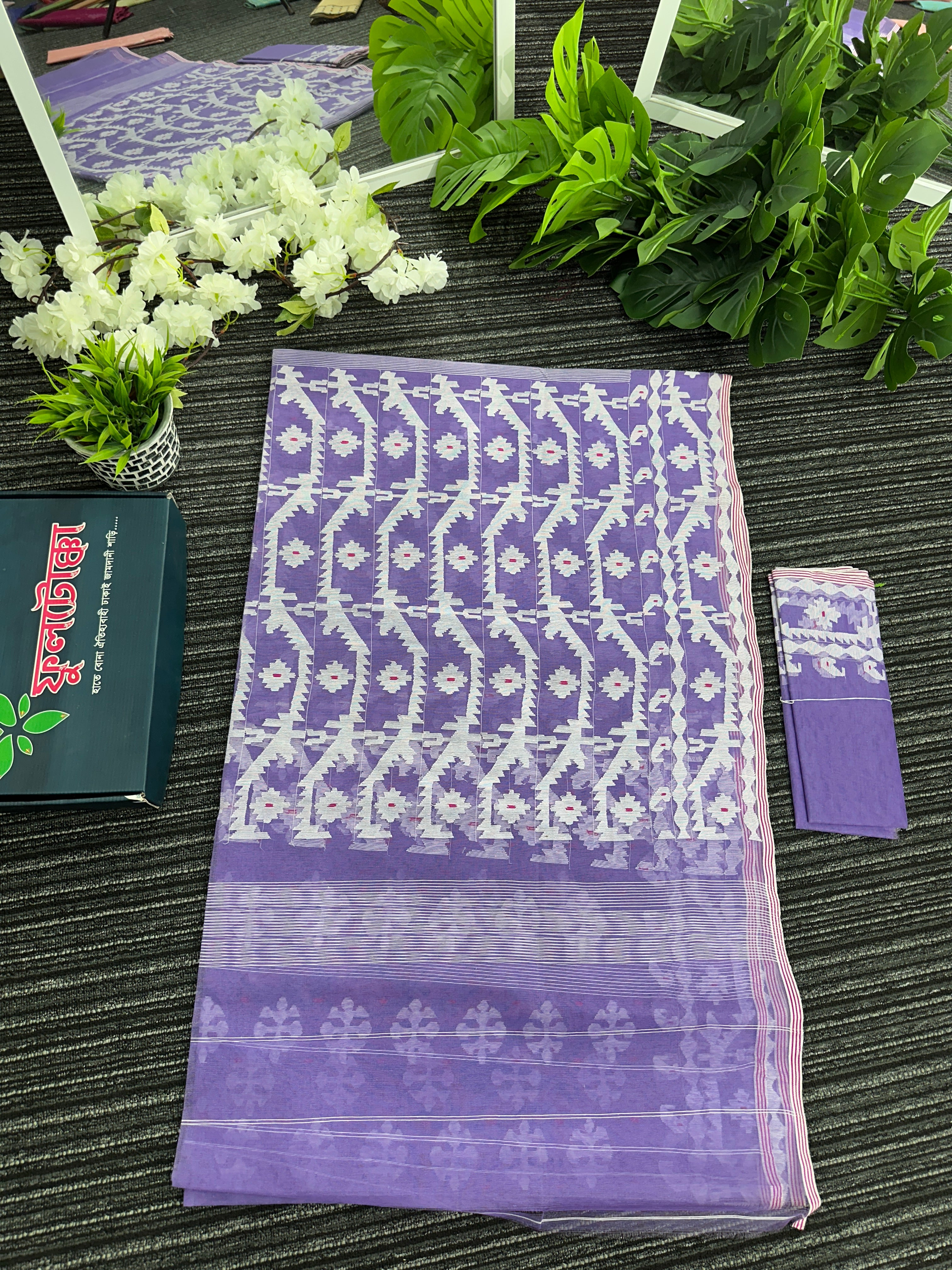 Lavendar halfsilk jamdani saree with white threads work and magenta meena work