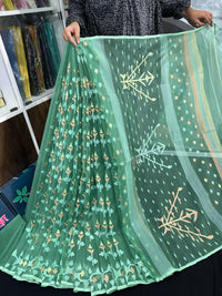 Jade green halfsilk jamdani saree with green off white golden self threads work