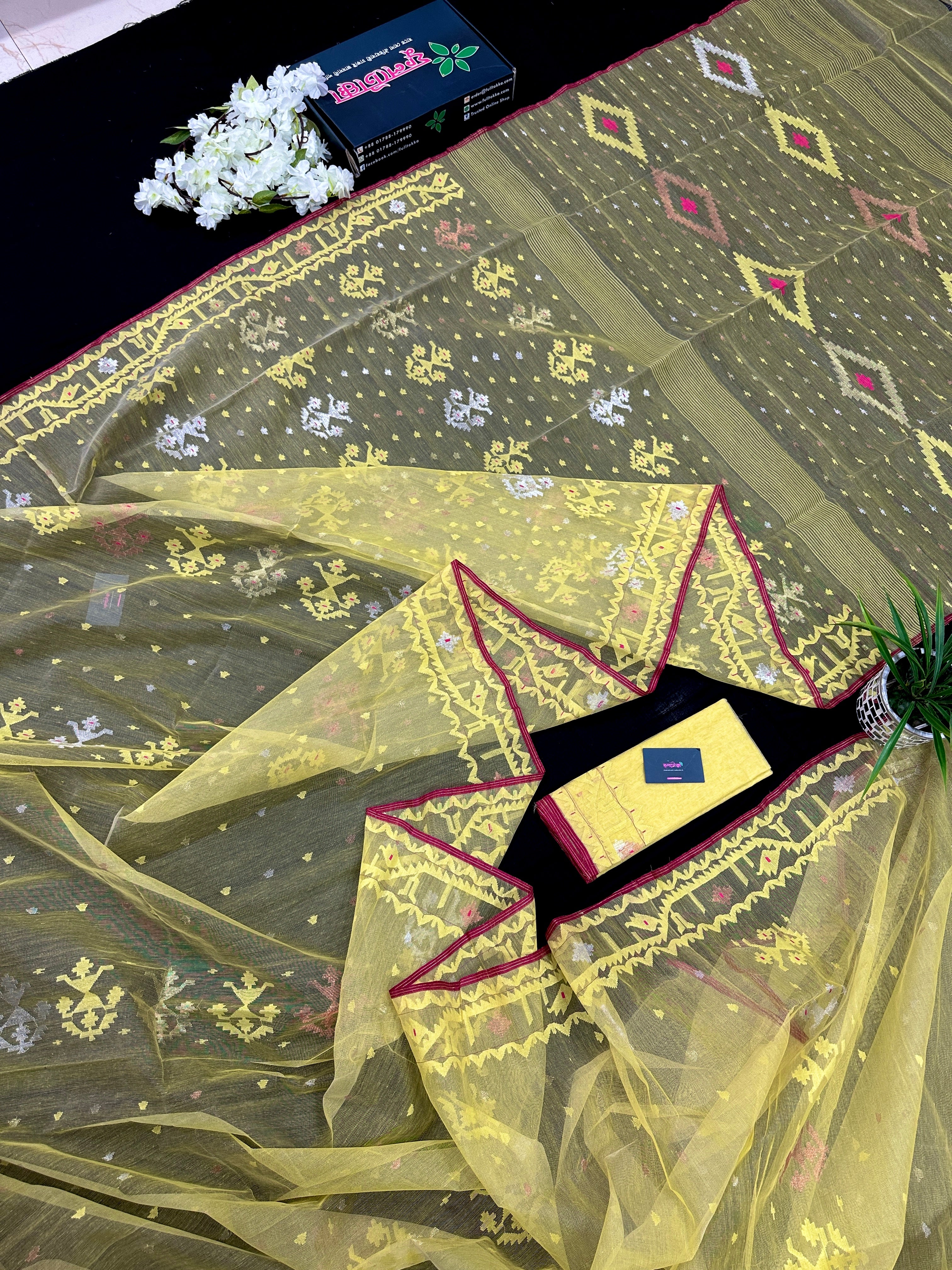 Pastel yellow dhakai jamdani saree with yellow threads silver & copper jori work all over work soft count.