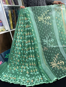 Jade green halfsilk jamdani saree with green off white golden self threads work