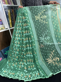 Jade green halfsilk jamdani saree with green off white golden self threads work