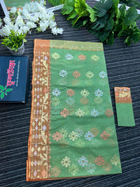 Pastel green halfsilk jamdani saree with golden brown contrast and golden silver copper jori work